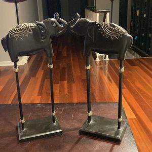 Two twelve in wooden elephant candle holders